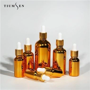 Flacon compte-gouttes doré